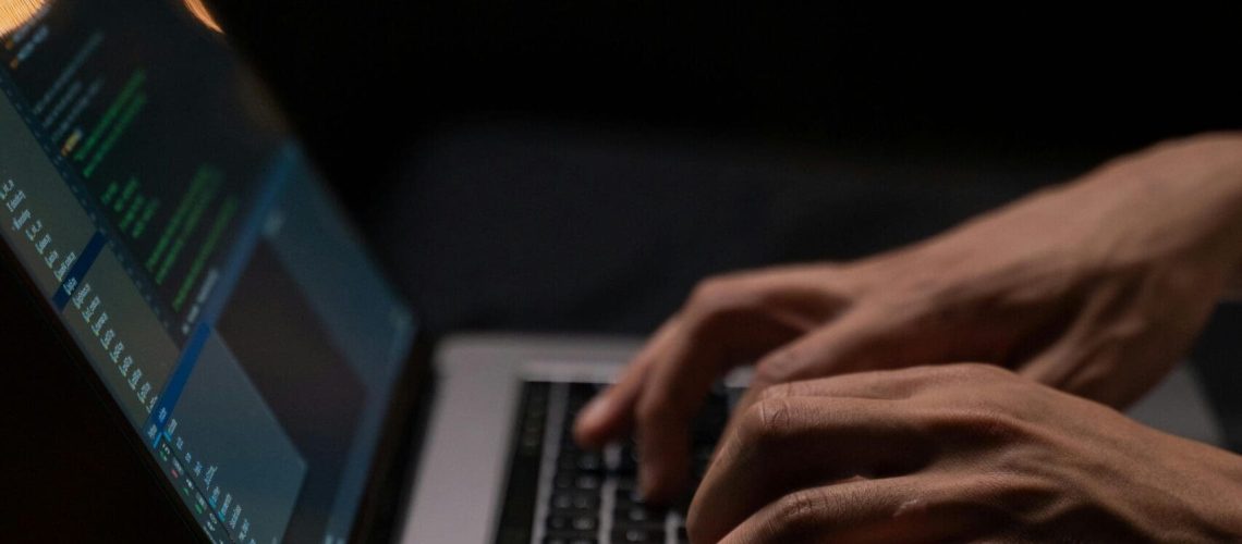 person-using-silver-and-black-laptop-computer